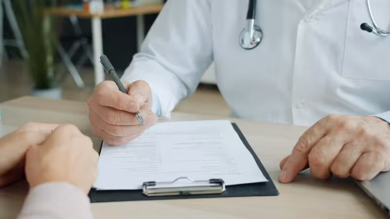 Disabled Parking: A doctor and patient during a consultation Doctor and patient consultation for Disabled Parking - Ashford - Private Microsuction Ear Wax Removal In Ashford TN24 Near M...